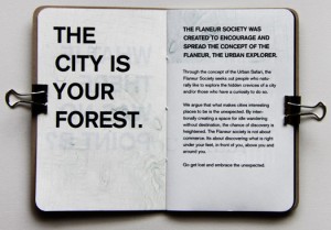 photo of an open book with the text "The City is your forest"